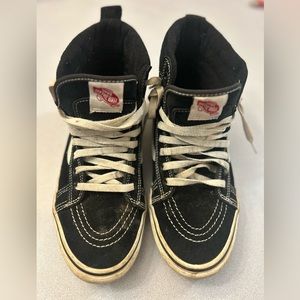 Vans perfectly worn in skateboarding shoes